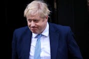 British Prime Minister Boris Johnson walks outside 10 Downing Street in London on Monday after the report was released.