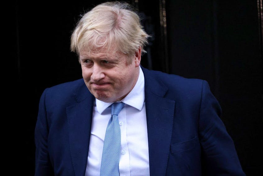  British Prime Minister Boris Johnson walks outside 10 Downing Street in London on Monday after the report was released.