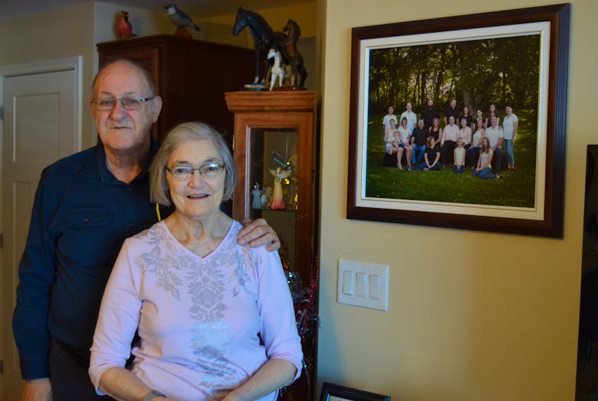 Florence Flynn, 79, right, a type-1 diabetic, was told when she married her husband, Wayne, she wouldn’t live to see her 30th birthday or have children. The picture on the right shows her four children and their families. This picture was taken at a safe distance.