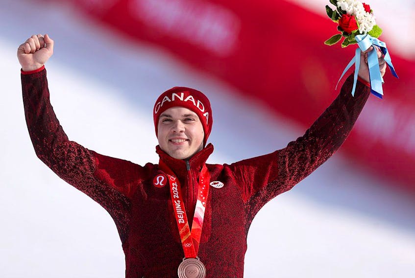 Bronze medalist James Crawford of Team Canada poses during the Men's Alpine Combined medal ceremony on day six of the Beijing 2022 Winter Olympic Games.