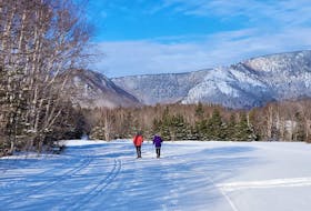 Snowshoers enjoy the splendour of the Cape Breton highlands while making their way along one of the many trails at North Highlands Nordic in Cape North, Cape Breton. CONTRIBUTED
