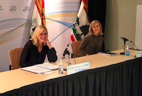 Chief public health officer Dr. Heather Morrison, left, and provincial epidemiologist Dr. Marguerite Cameron speak at a COVID-19 media briefing Feb. 8, 2022. 