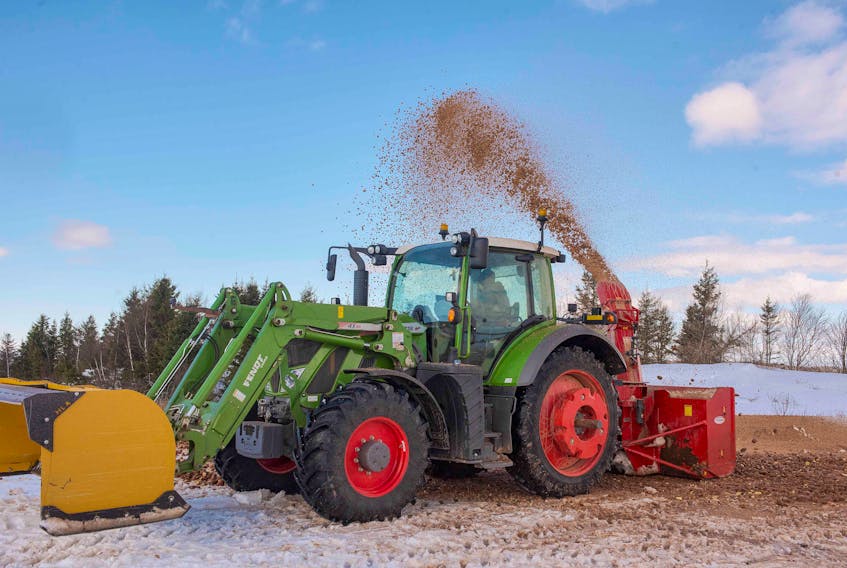 Logan Docherty of Skye View Farms in Elmwood uses a snow blower to destroy some of the millions of pounds of seed potatoes that the farm has to destroy due to border closures for P.E.I. potatoes that would have gone to the United States. Brian McInnis • Special to The Guardian