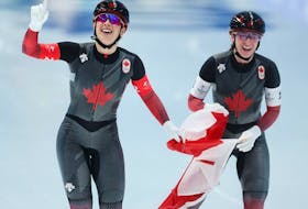 Ivanie Blondin and Valerie Maltais of Team Canada celebrate after winning the Gold medal in a new Olympic record time of 2:53.44 during the Women's Team Pursuit Final A.