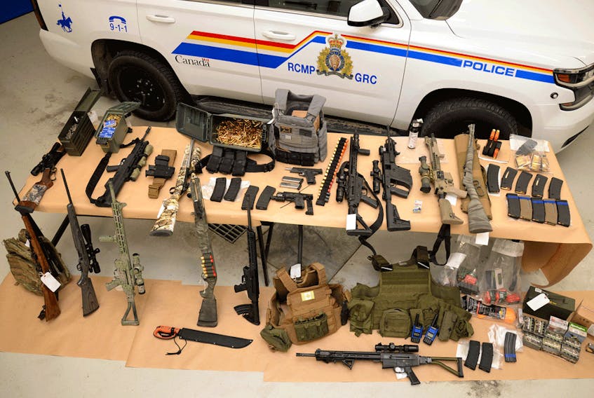  A large assortment of weapons and ammunition seized during an RCMP raid near Coutts, Alberta.