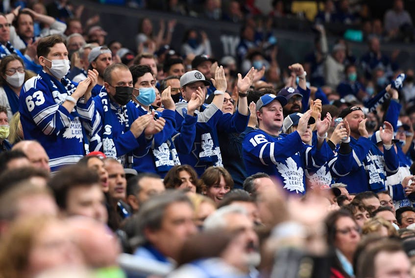 Maple Leafs fans applaud their team as they play against the Montreal Canadiens in a recent game at Scotiabank Arena.
