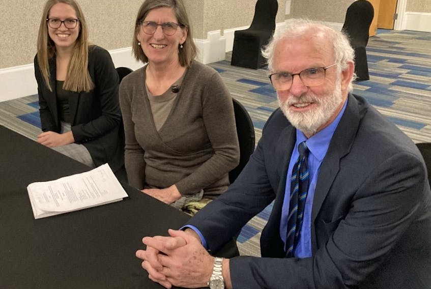 /Lawyer Vince Calderhead, accompanied by law student Elizabeth Dreise and Disability Rights coalition lawyer Claire McNeil, middle, sits in a Halifax conference room for a human rights commission board of inquiry hearing on Thursday, Feb. 16, 2022.
