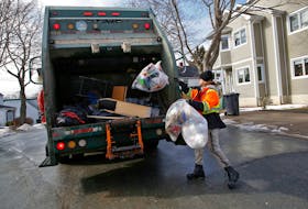 FOR NEWS/FILE:
Refuse workers remove trash on Maynard Strret in Dartmouth Thursday February 17, 2022.

TIM KROCHAK PHOTO