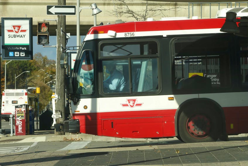 A TTC bus exits the Victoria Park subway station on Tuesday, Nov. 16, 2021.