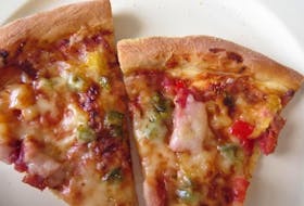 This pizza is made using the pizza dough recipe in this week’s column from Margaret Prouse. Toppings are tomato sauce, ham, pineapple, chopped red and green peppers and mozzarella cheese.
