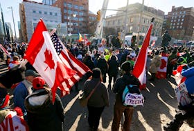  Freedom Convoy 2022 protesters demonstrate near Parliament Hill in Ottawa on January 31, 2022.