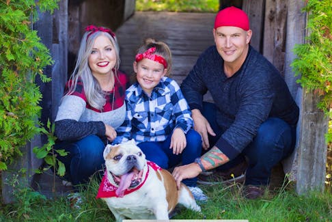Nicole and Chance Clark are pictured with their daughter, Madison. When Nicole was pregnant with their daughter, she was diagnosed with Hodgkin's lymphoma, a cancer of the lymphatic system.