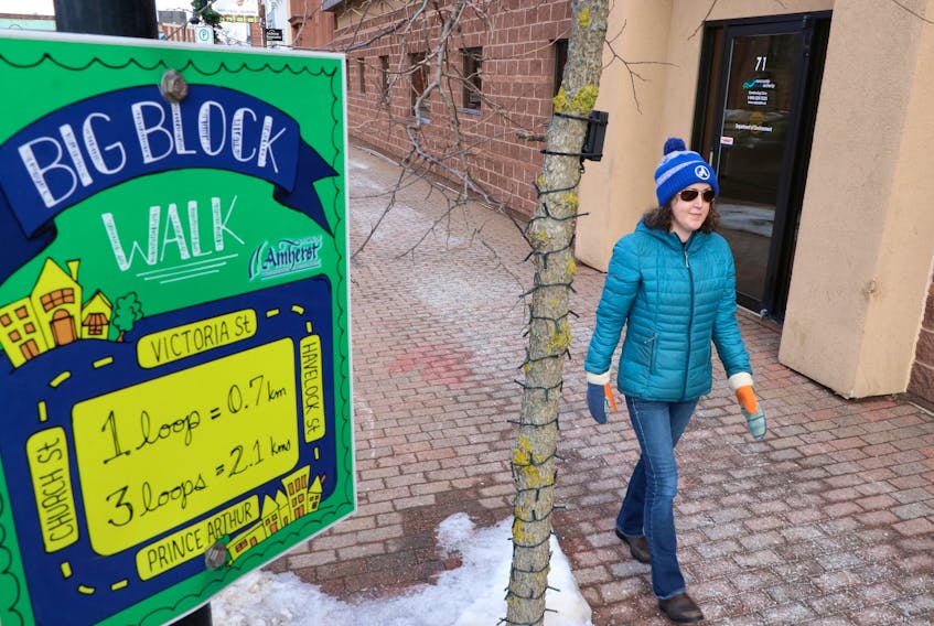 Allison Watson, Amherst’s active living co-ordinator, takes a stroll along the Big Block Walk in our local community. It's one of many routes people can take as they participate in the Amherst vs. Amherst Walking Challenge this month. CONTRIBUTED 