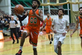 Veteran Cape Breton Capers guard Osman Omar is once again leading the AUS men's basketball conference in scoring. On Sunday, Omar, pictured above in action against Acadia from 2020, netted 30 points to lead the Capers to an 89-83 win over the Acadia Axeman in Wolfville. PHOTO CONTRIBUTED/VAUGHN MERCHANT CBU ATHLETICS