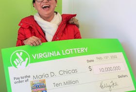 The state lottery said Maria Chicas, a stay-at-home mom, was given the Extreme Millions Scratcher ticket after her husband bought it at the In &amp; Out Mart on Mathis Avenue in Manassas, Va.
