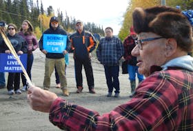 Elder 'uncle' Ken Mesher leads a prayer before Land Protectors and supporters walk on to the Muskrat Falls construction site on October 19, 2016. Photo by Justin Brake

