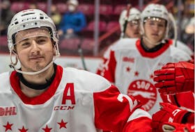 This has been a common sight this season -- Calgary Flames forward prospect Rory Kerins skating by the Soo Greyhounds bench to celebrate a goal. One of the Ontario Hockey League's top scorers, he is averaging 1.69 points per game so far in 2021-22. 