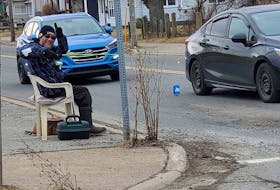 Michael "Bucky" Walzak decided he'd go fishing for beer in an ankle deep pothole at the corner of Plummer Avenue and King Street on February 21. Along with the enjoyment of drivers, Walzak wanted to bring attention to the dangerous pothole which was repaired by the CBRM the following day.