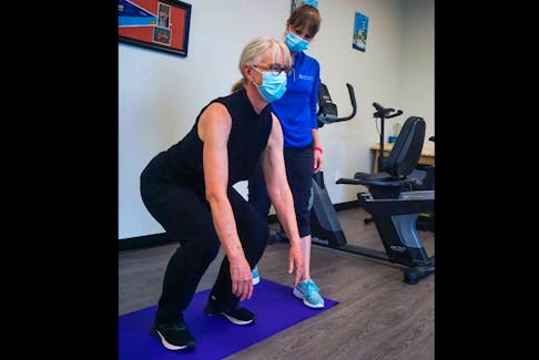 Laura Lundquist, PT (right), shares insight onto what kind of pain is helpful during exercise, and which is a sign that your exercise is harmful. Photo: Cathy Caldwell
