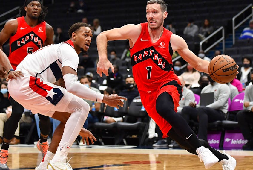 Raptors guard Goran Dragic dribbles against Wizards. Dragic likely will be dealt that the trade deadline. 
 
