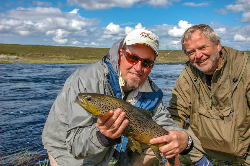 https://saltwire.imgix.net/2022/2/3/paul-smith-half-an-hour-to-catch-a-brown-trout-in-russia-1.jpg?cs=srgb&fit=crop&h=568&w=847&dpr=1&auto=enhance%2Ccompress%2Cformat