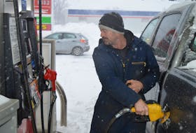 Darren Kennific of Morell pumps diesel at the Petro-Canada on Euston Street in Charlottetown on Feb. 4, the day the prices hit another all-time high.