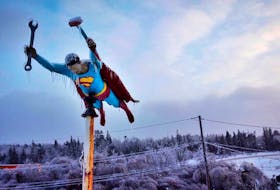FOR STANDALONE/STORM FOLO:
A superman figure covered in ice, looms over business near Mount Uniacke, NS following a winter storm Saturday February 5, 2022.

TIM KROCHAK PHOTO