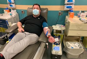 /Todd Bechard makes his 150th blood donation in Halifax on Wednesday, Feb. 2, 2022. Canadian Blood Services is looking for new donors as some of those who regularly donate haven't been able to during the Omicron wave.