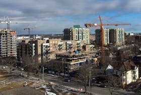 Construction cranes are seen above developments in progress on Almon Street in Halifax Wednesday February 9, 2022. For Census story.

TIM KROCHAK PHOTO