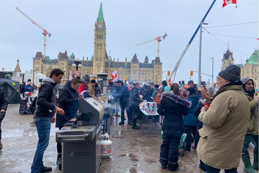 The "Freedom Convoy" protest against COVID-19 mandates continued in downtown Ottawa in front of Parliament Hill Wednesday.