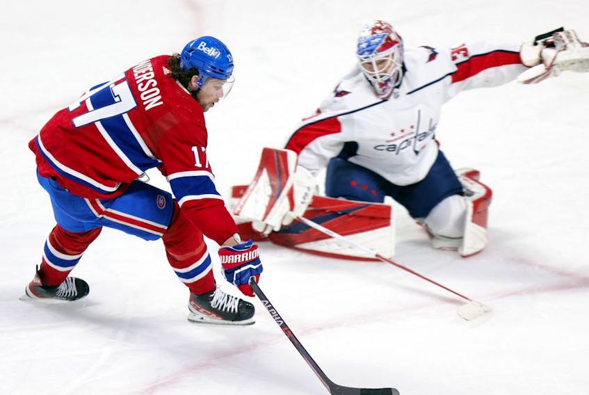 Montreal Canadiens' Josh Anderson has the puck poked away from him by Washington Capitals Ilya Samsonov during second period in Montreal on Feb. 10, 2022. 