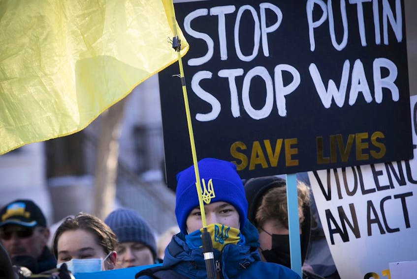 Protesters rally in support of the people of Ukraine at the Roddick gates in Montreal last week. Russian President Vladimir Putin’s  aggression against Ukraine has seen him badly losing the battle of public opinion, experts say. 