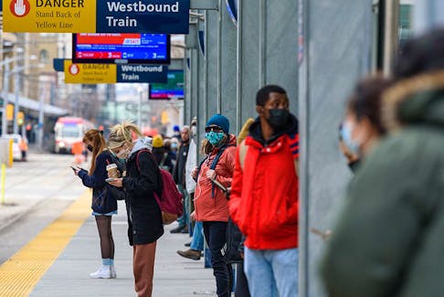 Calgarians are asked to continue wearing a mask while using public transit as most COVID-19 restrictions are lifted on March 1, 2022. Photographed on Monday, February 28, 2022.