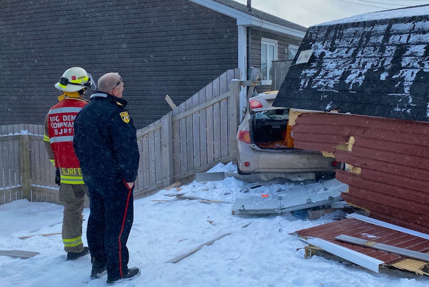 The driver of this vehicle was trapped after driving through a shed and into the back of a house on Mount Carson Avenue Tuesday morning, March 1.