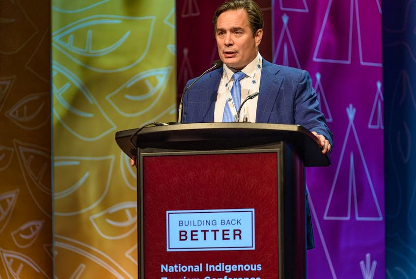 Keith Henry, president and CEO of Indigenous Tourism Association of Canada (ITAC), speaks during the National Indigenous Tourism Conference at Grey Eagle Event Centre on Wednesday, March 9, 2022.
