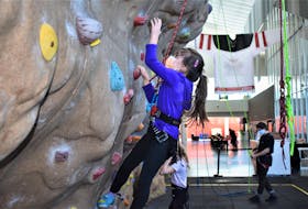Evie Harrington tries her hand at the rock climbing wall at the Rath Eastlink Community Centre (RECC) during a recent Saturday. The wall will be part of the activities during March Break Day Camps at the RECC.