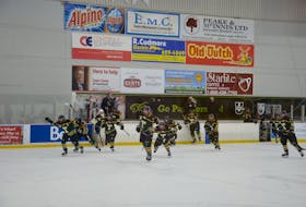 The St. Thomas Tommies charge off the bench to celebrate a 3-2 road victory over the UPEI Panthers in an Atlantic University Sport women’s hockey game at MacLauchlan Arena on March 9. The Tommies scored the winning goal in the final minute of regulation time.