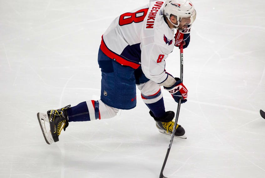 Washington Capitals Alex Ovechkin (8) fires the puck on the Edmonton Oilers during second period NHL action on Wednesday, March 9, 2022 in Edmonton.     