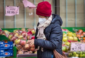 A woman shops for groceries at Toronto's Yao Hua Supermarket.
