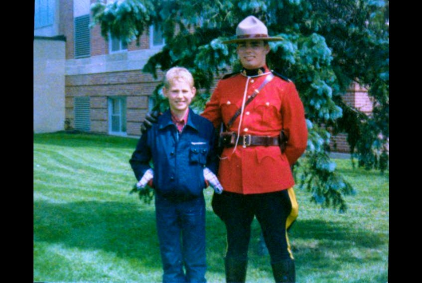 Gabriel Wortman is shown as a boy with his uncle Chris Wortman at his graduation from RCMP academy in Regina, Saskatchewan. Contributed