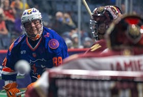 Albany FireWolves goaltender Doug Jamieson turns aside a shot by Halifax Thunderbirds captain Cody Jamieson (no relation) during National Lacrosse League play Friday night at Scotiabank Centre. Albany won 8-7. - TREVOR MacMILLAN / HALIFAX THUNDERBIRDS