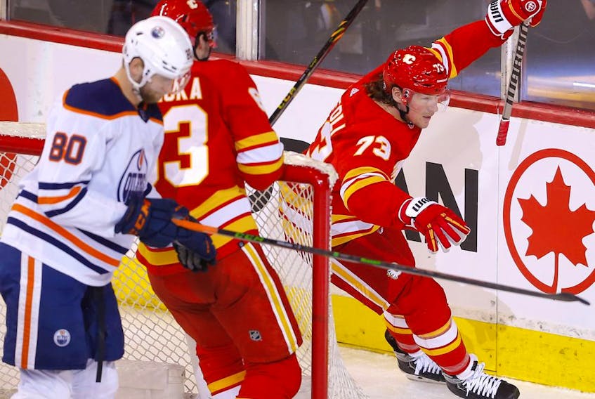  Calgary Flames forward Tyler Toffoli (right) celebrates after scoring his second goal of the game against the Edmonton Oilers at Scotiabank Saddledome in Calgary on Monday, March 7, 2022.