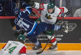 Halifax Mooseheads defenceman Stephen Davis levels Chicoutimi Sagueneens forward Cael MacDonald during the second period of a QMJHL game on Saturday, March 12, 2022. 
Ryan Taplin - The Chronicle Herald