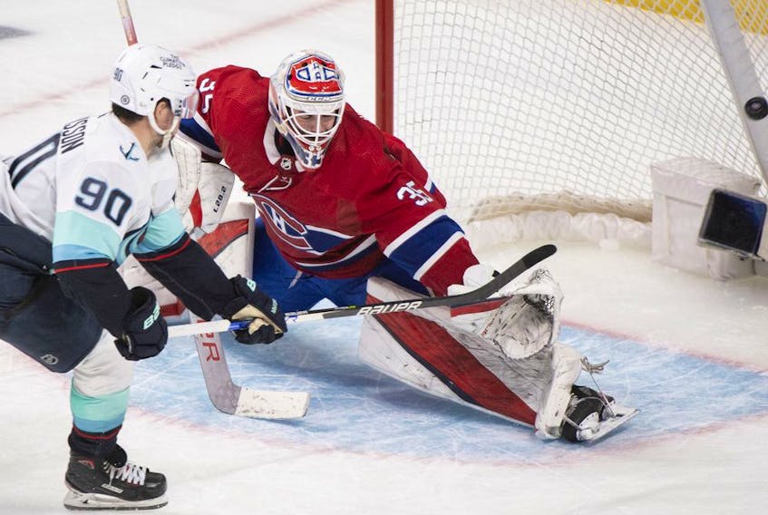  Seattle Kraken’s Marcus Johansson scores against Canadiens goaltender Sam Montembeault during NHL shootout action in Montreal on Saturday, March 12, 2022.