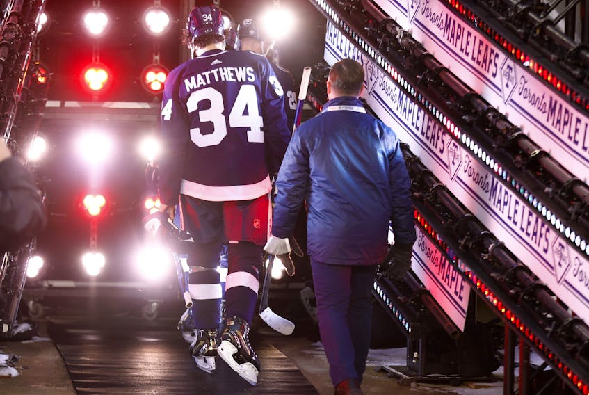 Maple Leafs' Auston Matthews leaves the ice after a loss against the Buffalo Sabres during the Heritage Classic at Tim Hortons Field on March 13, 2022 in Hamilton.