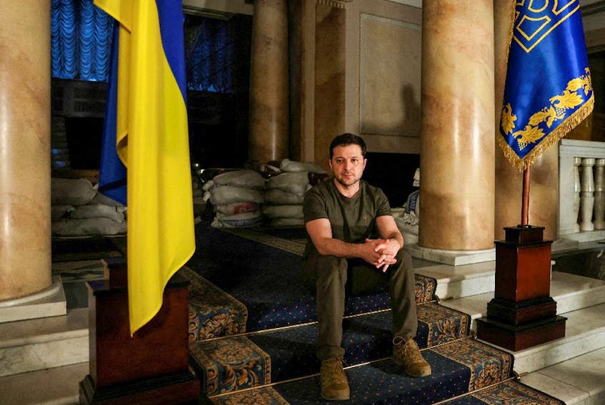 Ukrainian President Volodymyr Zelenskyy poses after an interview with Reuters in Kyiv, Ukraine, March 1, 2022.