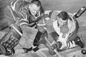  Former Canadiens great Ralph Backstrom, right, battles for a loose puck with Leafs legend Johnny Bower during their heyday. The late Backstrom had also suffered from Lewy Body Dementia and CTE. SUN FILES