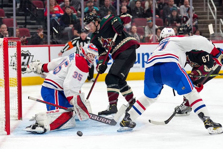 Arizona Coyotes right wing Christian Fischer (36) shoots against Montreal Canadiens goaltender Sam Montembeault (35) during the third period at Gila River Arena Monday, Jan. 17 in Glendale, Ariz.