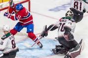Montreal Canadiens right wing Brendan Gallagher (11) collides with the net of Arizona Coyotes goaltender Karel Vejmelka (70) during 1st period NHL action at the Bell Centre in Montreal on Tuesday March 15, 2022.