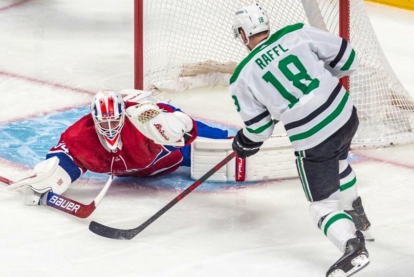 Jake Allen had to stretch to make a few big saves during the game Thursday night at the Bell Centre, like this one against the Stars' Michael Raffl. It was Allen's first game back since suffering a groin injury on Jan. 12.